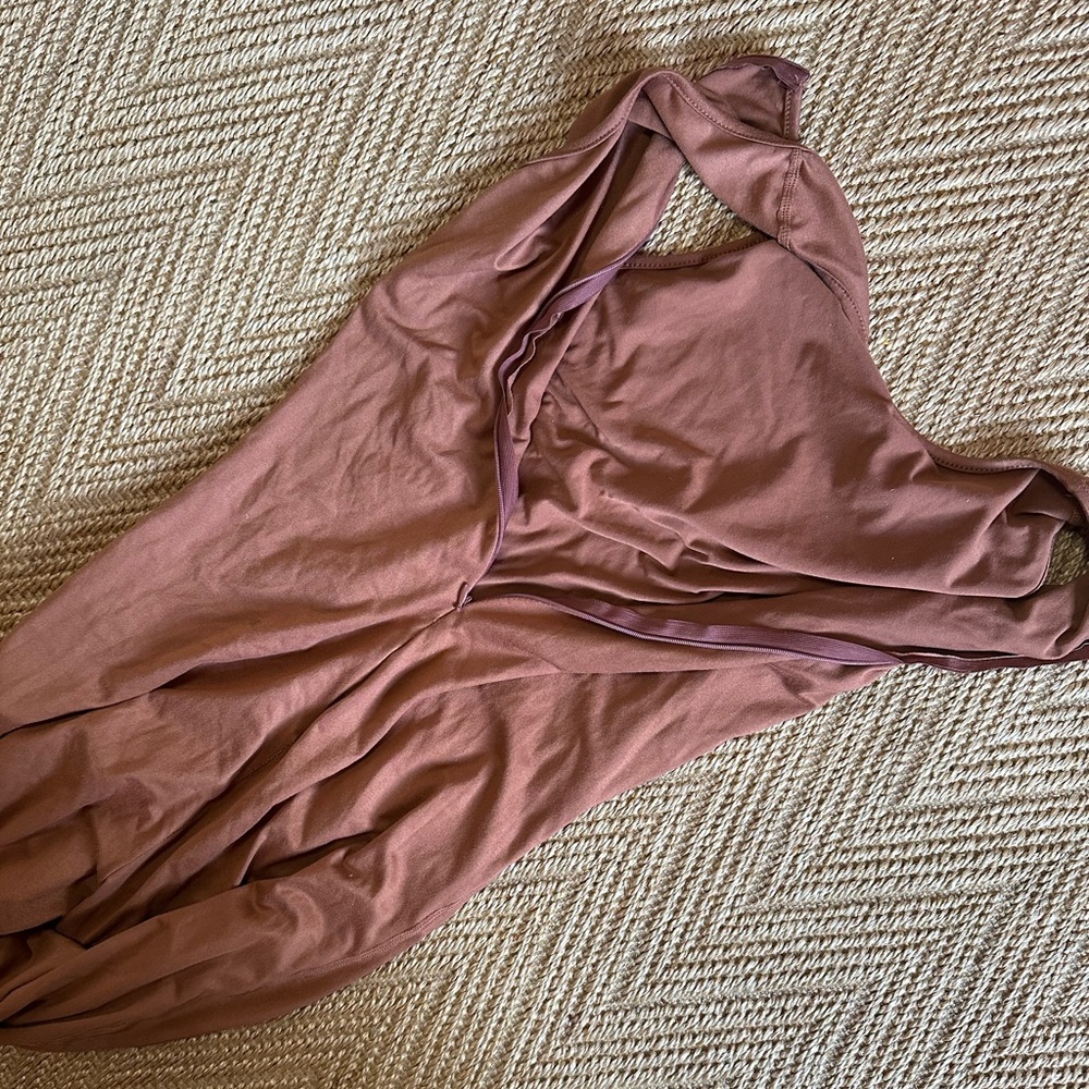 Tan onesie medium